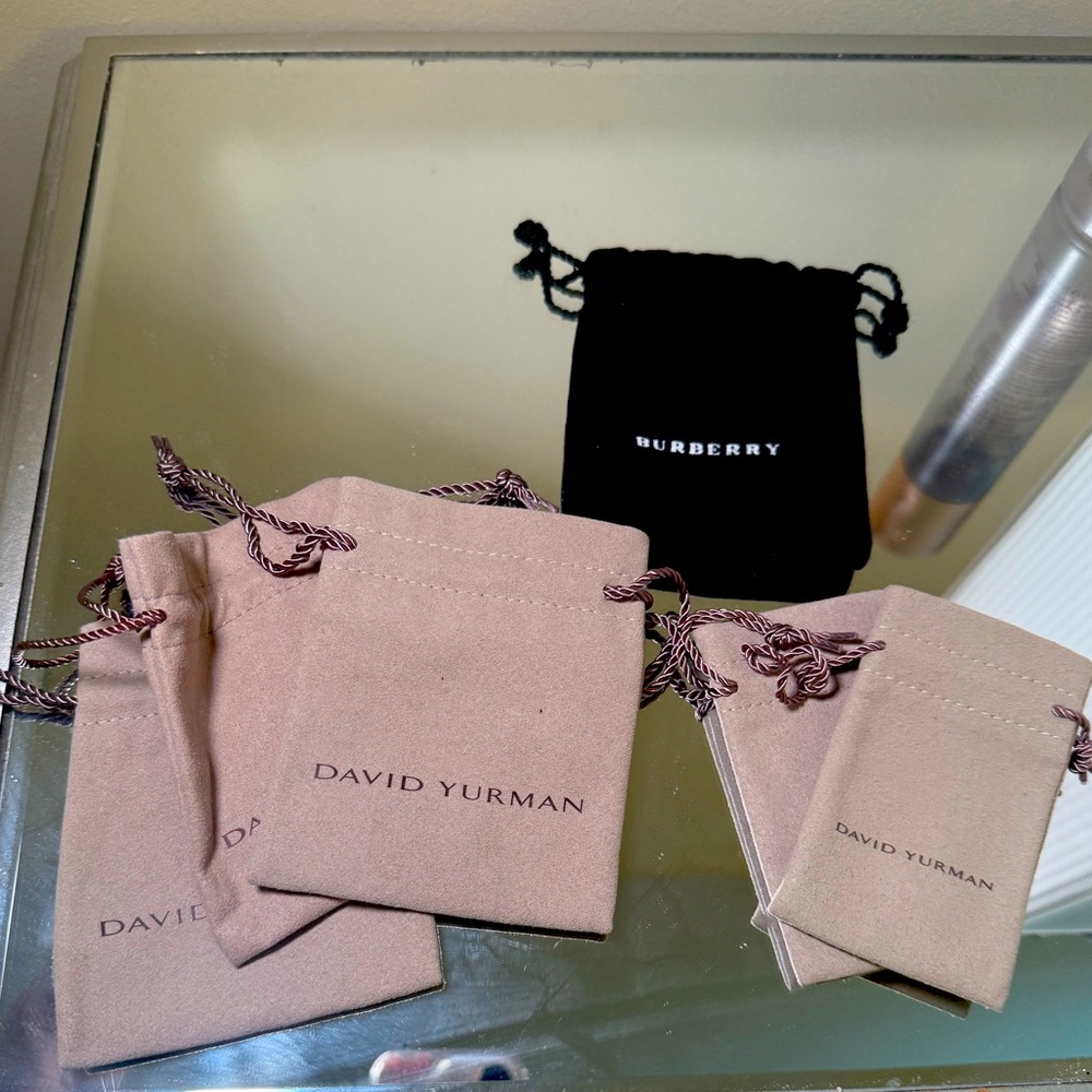 Authentic David Yurman and Burberry pouches for travel/jewelry storage